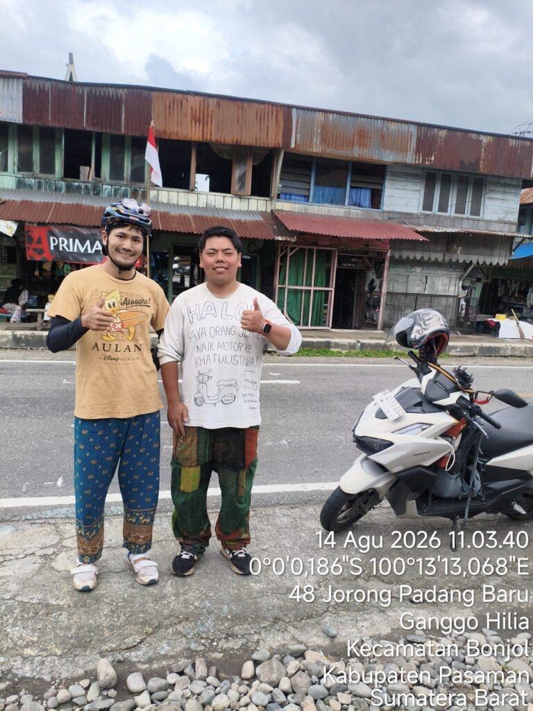 motorbike rental Medan tourists at Equator Monument Bonjol